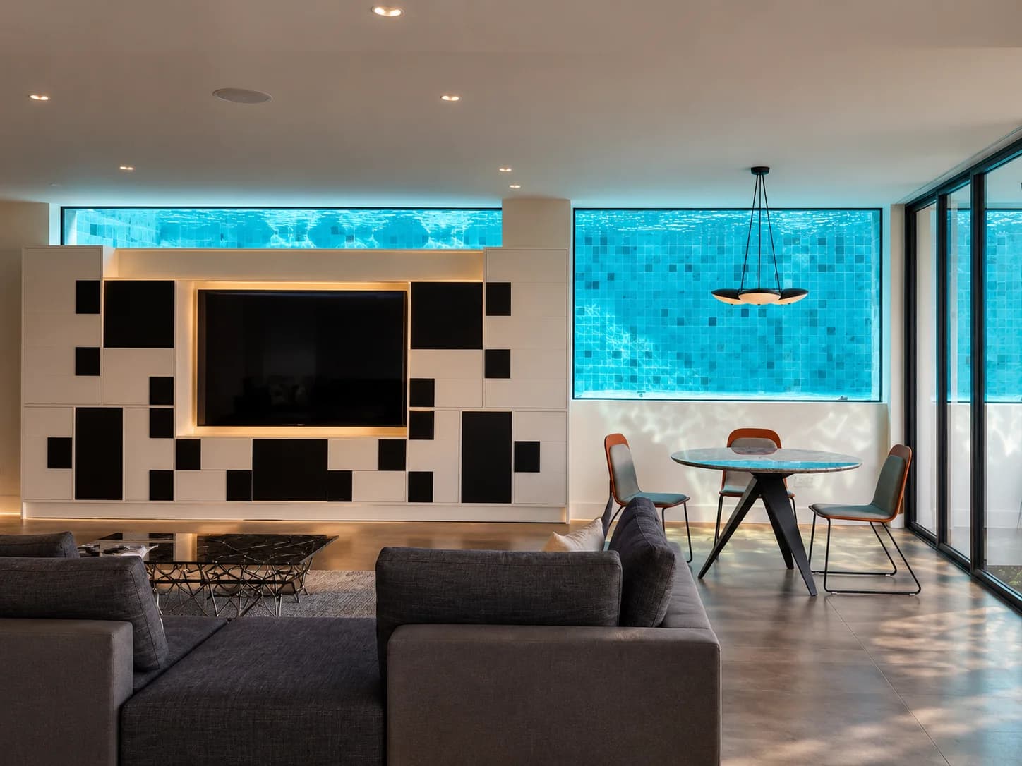 Acrylic pool windows viewed from the living room at House off Bin Tong Park